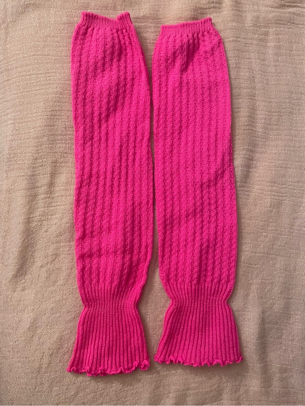 Pink ribbed knit leg warmers